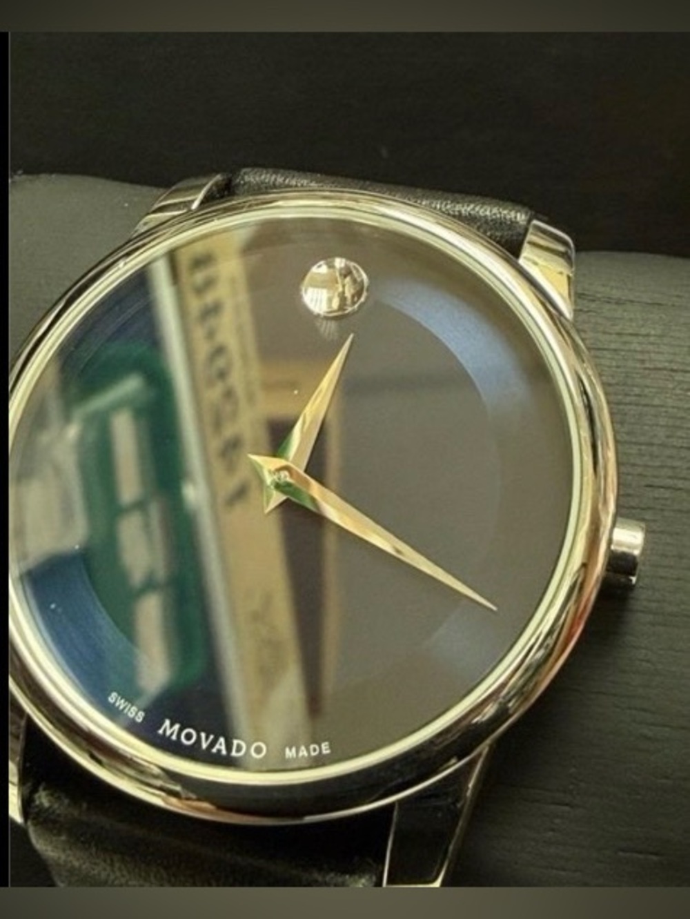 Movado Black Dial Watch with Gold Hands